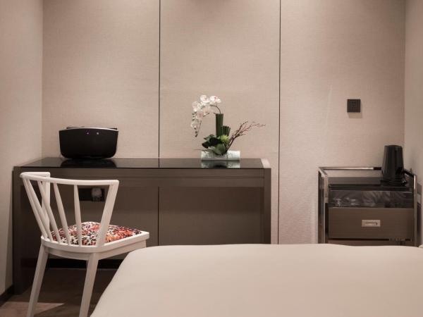 Paco Hotel Dongpu Guanghzou -Free Shuttle Bus for Canton Fair : photo 4 de la chambre chambre lit king-size affaires