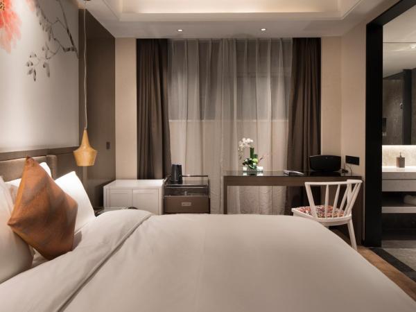 Paco Hotel Dongpu Guanghzou -Free Shuttle Bus for Canton Fair : photo 3 de la chambre chambre lit king-size deluxe