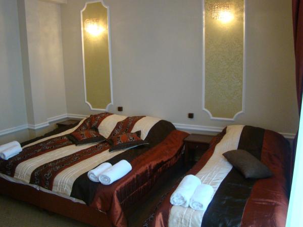 Dworek Vesaria : photo 4 de la chambre chambre triple