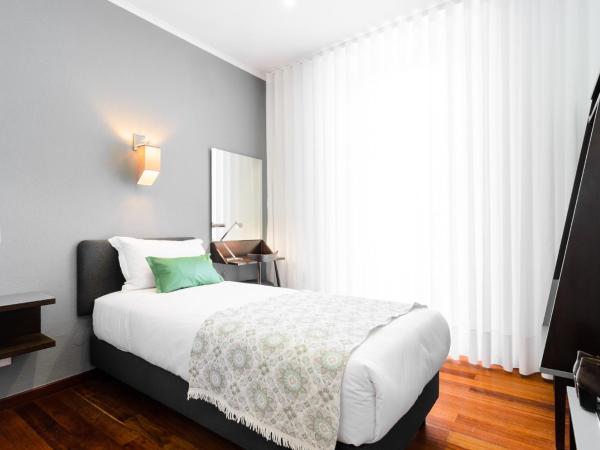 Hotel Portuense Lisboa : photo 1 de la chambre chambre simple