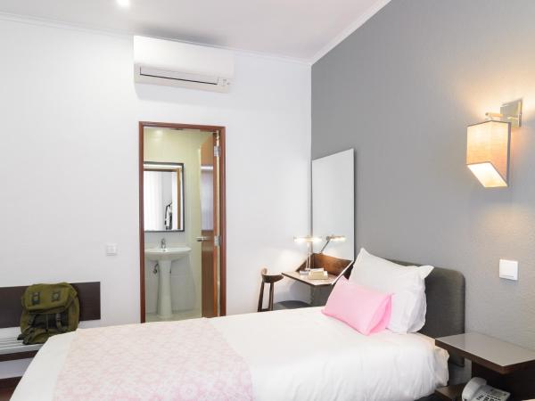 Hotel Portuense Lisboa : photo 1 de la chambre chambre triple