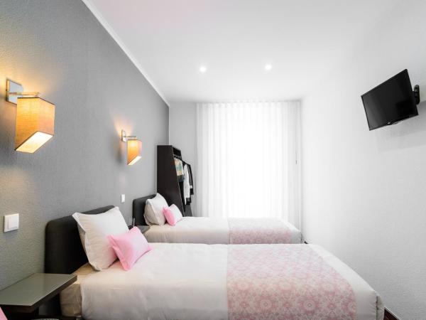 Hotel Portuense Lisboa : photo 3 de la chambre chambre triple