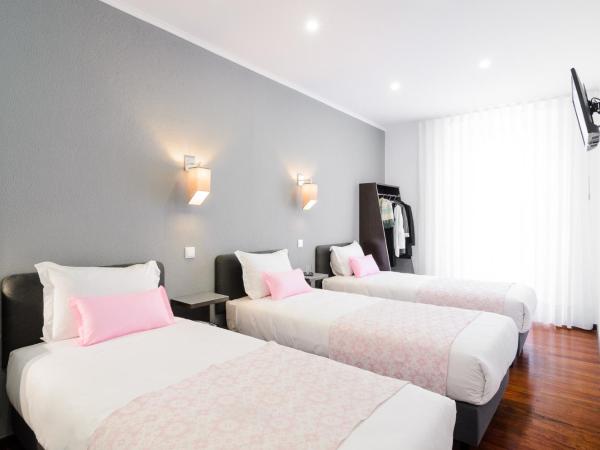 Hotel Portuense Lisboa : photo 5 de la chambre chambre triple