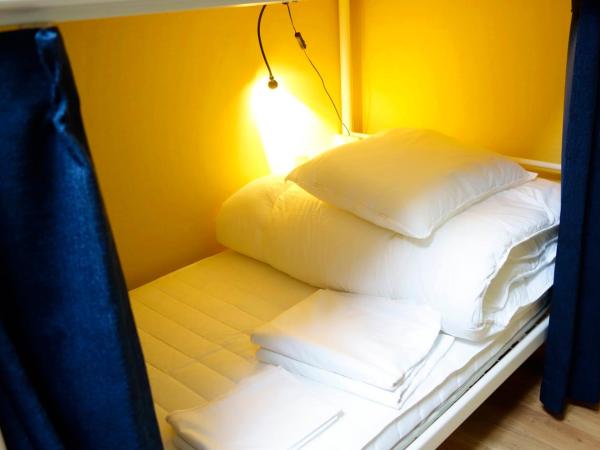 Fukuoka Tabiji Hostel & Guesthouse : photo 4 de la chambre lit dans dortoir mixte de 4 lits