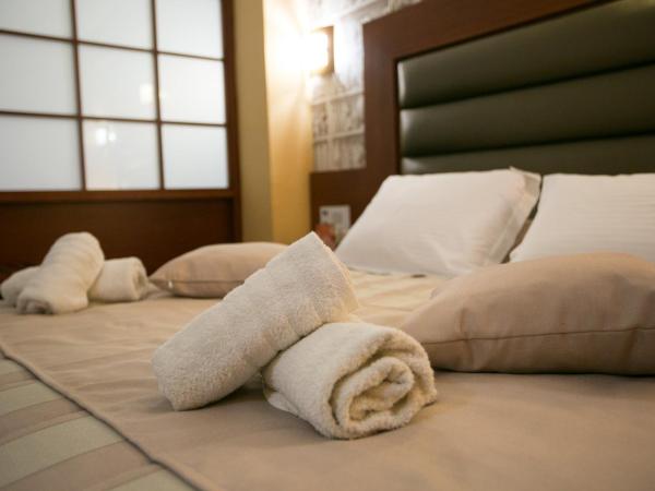 City Life Hotel : photo 4 de la chambre suite familiale