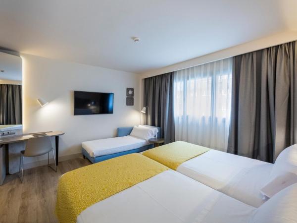 Catalonia Granada : photo 1 de la chambre chambre triple