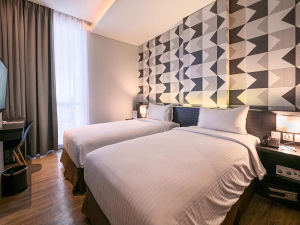 Luminor Hotel Jemursari By WH : photo 5 de la chambre chambre deluxe double ou lits jumeaux