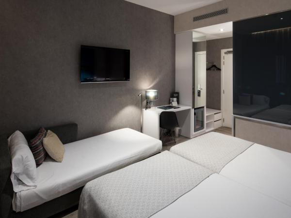 Catalonia Gran Via BCN : photo 2 de la chambre chambre triple