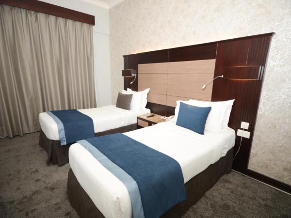 Fortune Grand Hotel : photo 2 de la chambre chambre lits jumeaux