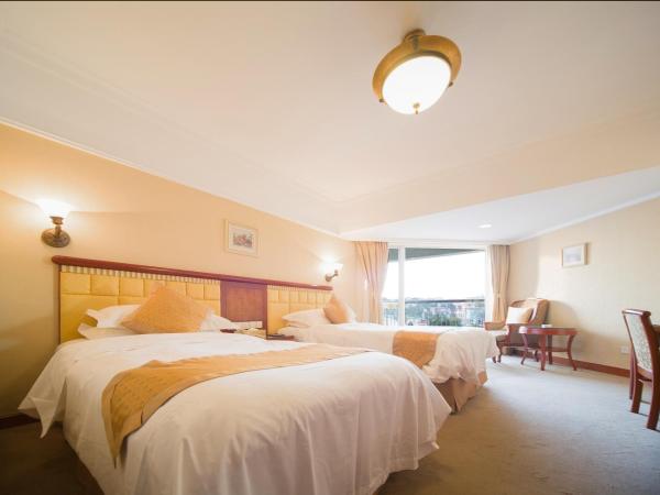 Huiquan Dynasty Hotel Qingdao : photo 2 de la chambre south wing twin room with sea view