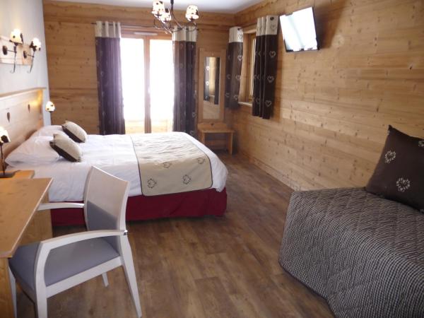 Chalet-Hôtel Le Beausoleil, The Originals Relais : photo 4 de la chambre chambre quadruple