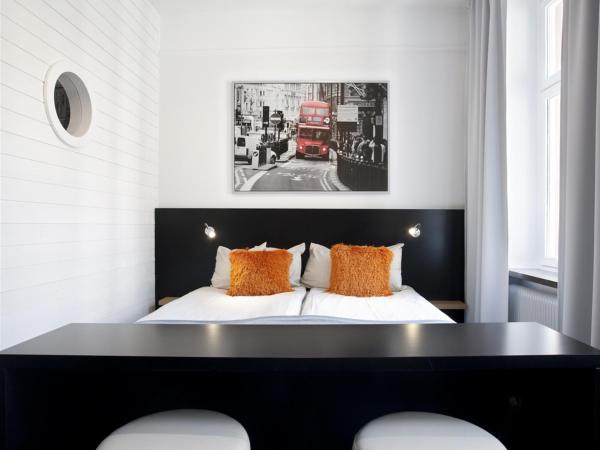 Hotel Örebro : photo 2 de la chambre chambre quadruple supérieure