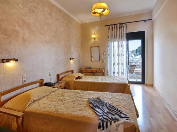 Hotel Atlantis : photo 2 de la chambre chambre double ou lits jumeaux - vue partielle sur mer