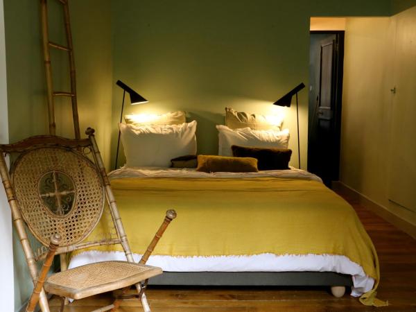 Le 66 : photo 2 de la chambre chambre double - vue sur jardin