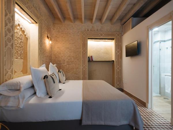 Hommyhome Casa Assle : photo 2 de la chambre suite supérieure lit king-size