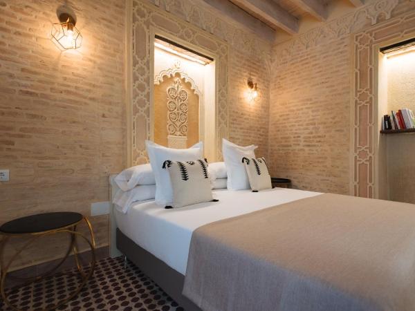 Hommyhome Casa Assle : photo 3 de la chambre suite supérieure lit king-size