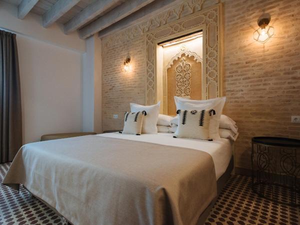 Hommyhome Casa Assle : photo 6 de la chambre suite supérieure lit king-size