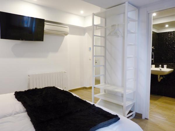 Pensión Lo Bilbao : photo 2 de la chambre chambre lits jumeaux pour personnes à mobilité réduite