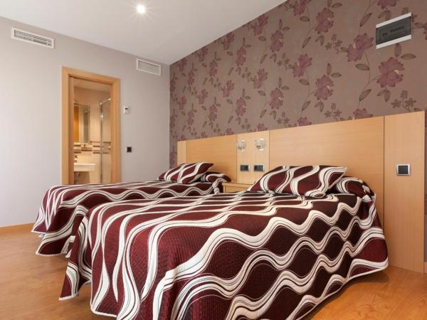 Hostal Jemasaca-Palma61 : photo 2 de la chambre chambre double avec lit d'appoint (3 adultes)