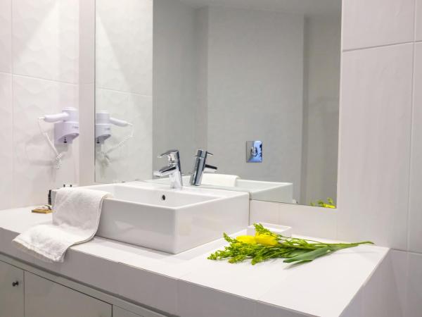 Lotus Inn : photo 10 de la chambre chambre double de luxe avec vue sur rue