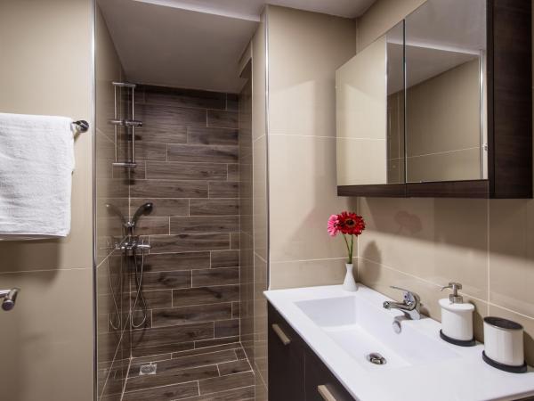 Dorian Boutique Hotel-Apartments : photo 8 de la chambre suite familiale décloisonnée au rez-de-chaussée