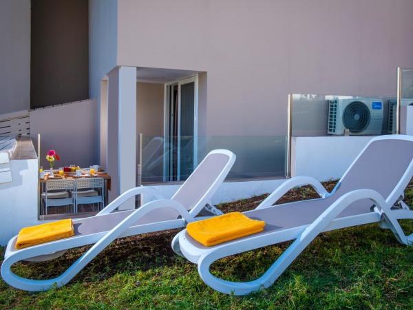 Dorian Boutique Hotel-Apartments : photo 2 de la chambre suite familiale décloisonnée au rez-de-chaussée