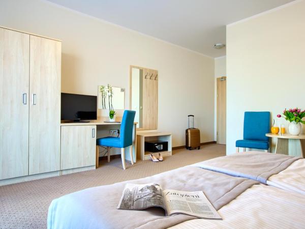 Laguna : photo 4 de la chambre chambre double ou lits jumeaux avec balcon