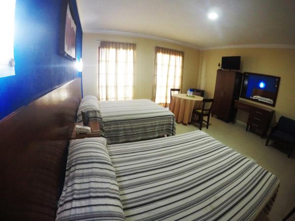 Hotel Oriente : photo 4 de la chambre chambre double supérieure avec deux lits doubles