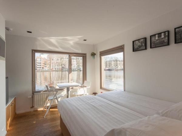 Houseboat Little Amstel : photo 1 de la chambre chambre lits jumeaux standard avec vue sur la rivière