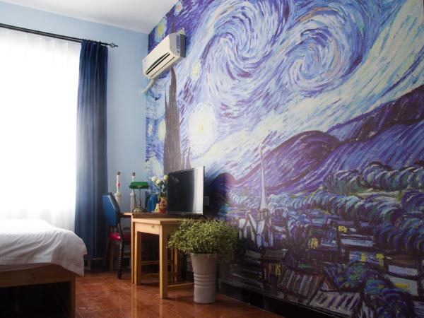 大连天天青旅民宿 : photo 1 de la chambre chambre lit queen-size