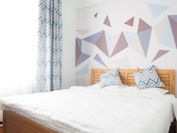 大连天天青旅民宿 : photo 6 de la chambre chambre lit queen-size