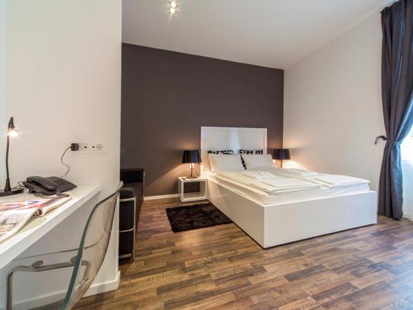 Priuli Luxury Rooms : photo 6 de la chambre chambre double confort avec canapé - bâtiment principal - 1 rue sinjska