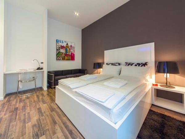 Priuli Luxury Rooms : photo 5 de la chambre chambre double confort avec canapé - bâtiment principal - 1 rue sinjska