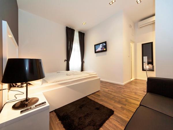 Priuli Luxury Rooms : photo 4 de la chambre chambre double confort avec canapé - bâtiment principal - 1 rue sinjska