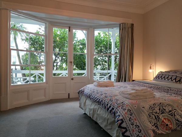 Western Springs Villa to Auckland Central Heritage Villa : photo 2 de la chambre chambre lit king-size