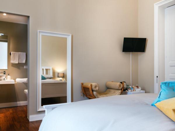 b&b le 4 leggende : photo 5 de la chambre chambre double deluxe avec balcon