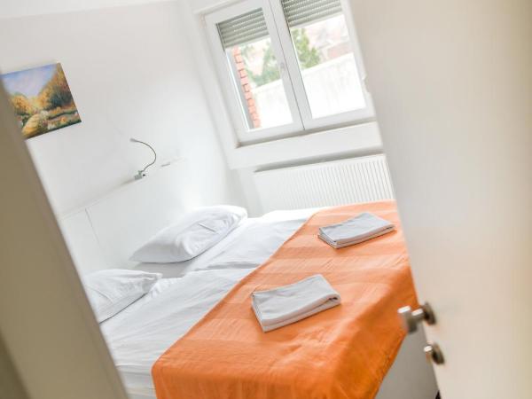 Tia Apartments and Rooms : photo 9 de la chambre chambre lits jumeaux confort