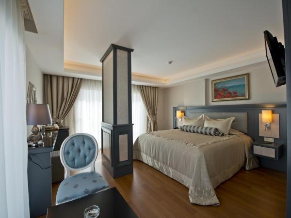 Prime Boutique Hotel : photo 9 de la chambre chambre de luxe avec vue partielle sur la mer