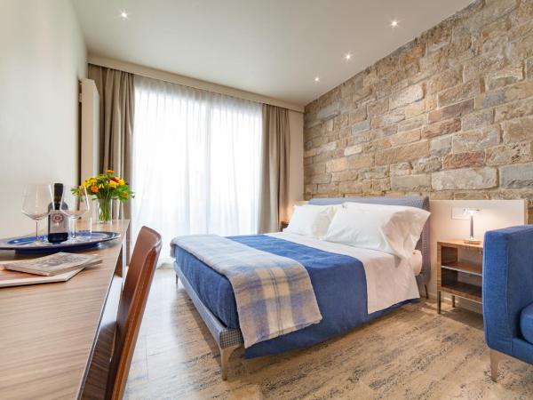 Le Stanze degli Amidei : photo 1 de la chambre grande chambre double