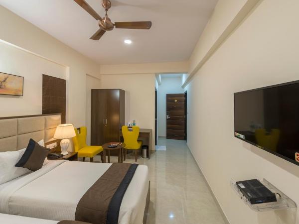 Daffodil Delight - Manyata Tech Park : photo 2 de la chambre chambre double ou lits jumeaux standard