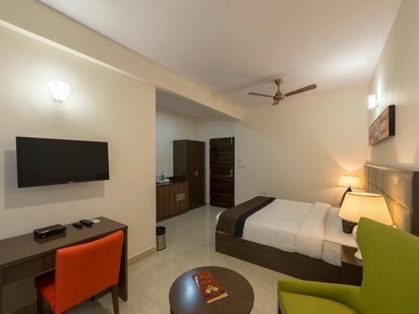 Daffodil Delight - Manyata Tech Park : photo 2 de la chambre chambre double ou lits jumeaux deluxe avec balcon