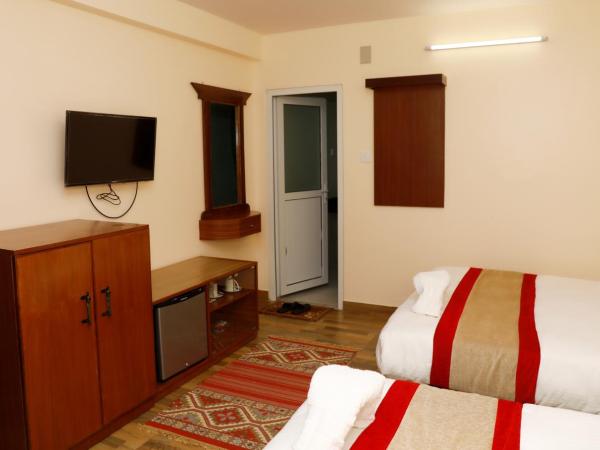 Hotel Guru : photo 7 de la chambre chambre double ou lits jumeaux deluxe - vue sur montagne