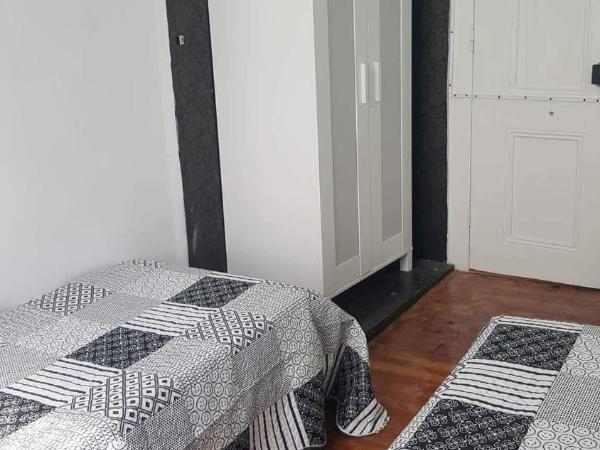 Cenário Catita Hostel : photo 9 de la chambre chambre lits jumeaux avec toilettes communes