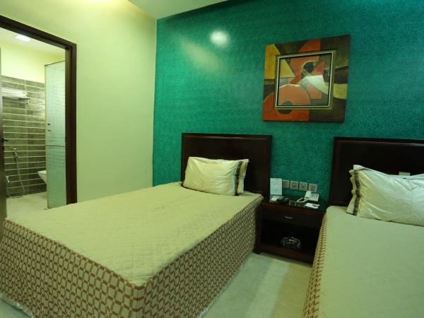 Golden Orchid - Kolkata : photo 1 de la chambre chambre lit king-size