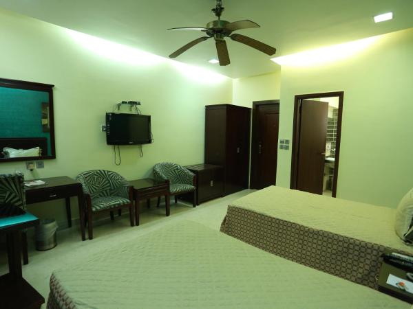 Golden Orchid - Kolkata : photo 2 de la chambre chambre lit king-size