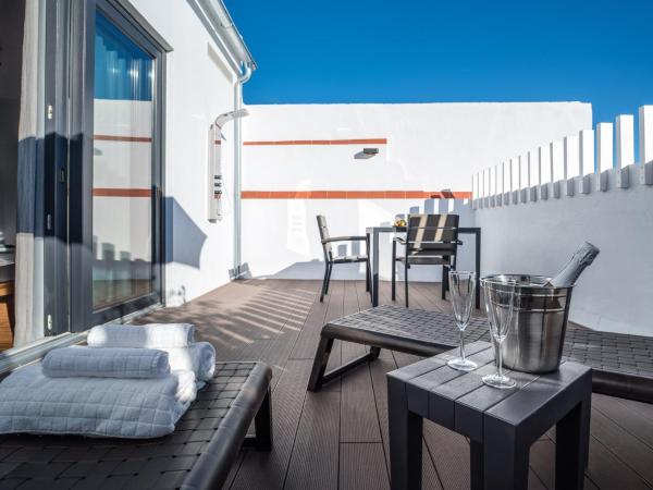 Welldone Antiquarium : photo 1 de la chambre appartement de grand standing avec terrasse