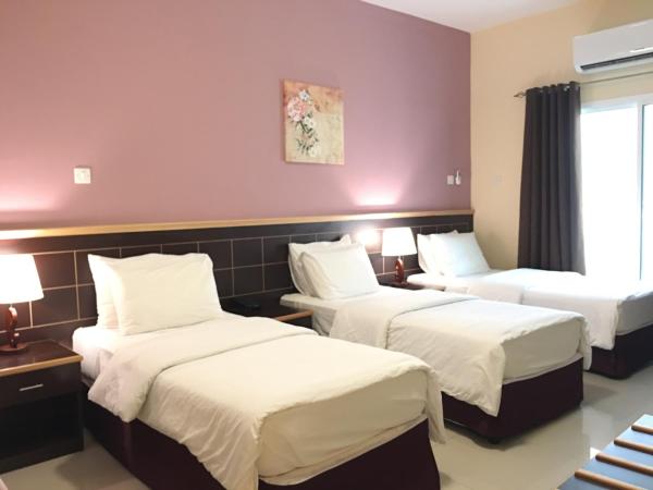 Mutrah Hotel : photo 3 de la chambre chambre triple standard