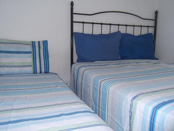 Tião Botelho Guest House : photo 4 de la chambre chambre deluxe double ou lits jumeaux