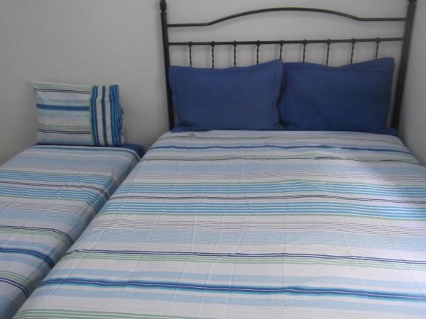 Tião Botelho Guest House : photo 2 de la chambre chambre deluxe double ou lits jumeaux