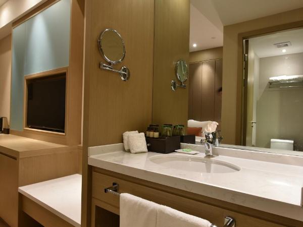 SHANGHAI-DECO Hotel-Free shuttle bus from Pudong Airport and Disneyland : photo 9 de la chambre chambre lits jumeaux standard